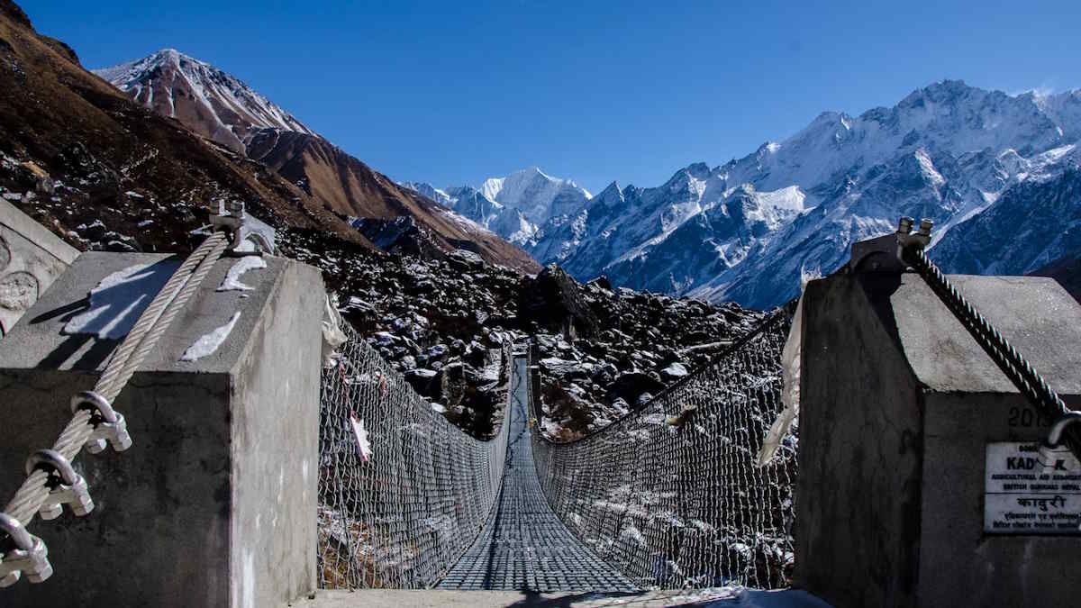 Rope bridge in a mountainous landscape