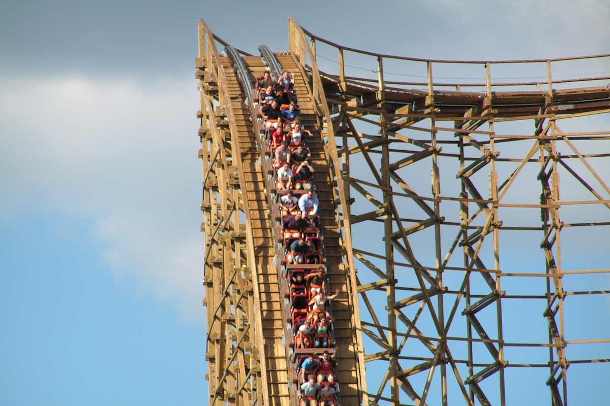 The drop of a wooden roller coaster at Six Flags, showing the reaction of riders