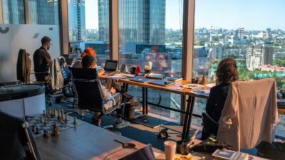 Photo of an office in a high-rise building with the desk against the window